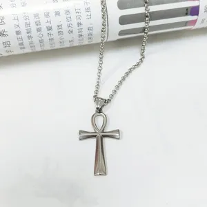 Detailed view of the polished stainless steel Ankh cross pendant on a sturdy link chain