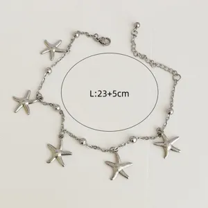 Detailed view of a silver stainless steel anklet with starfish charms, length L:23+5cm
