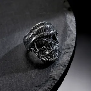 Vintage bearded pirate skull ring with beanie and eyepatch in distressed silver finish.