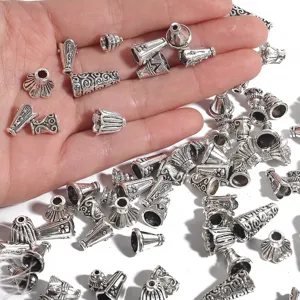 Vue détaillée de capuchons de glands en alliage argenté antique pour la création de bijoux
