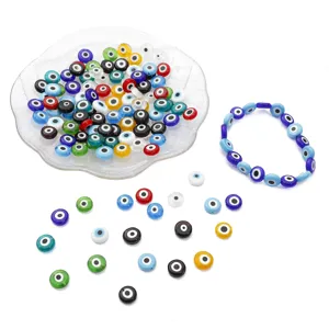 Detailed macro view of colorful flat round glass evil eye beads and finished jewelry bracelet