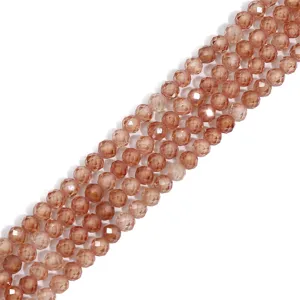 Macro view of peach faceted synthetic crystal beads for DIY jewelry making