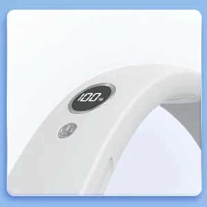 Detail of bladeless neck fan digital display showing battery percentage and power button