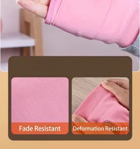 Detail of durable pink USB heated gloves showing high-quality fabric and elastic cuffs