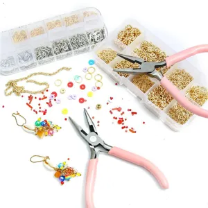 Detailed view of pink jewelry pliers set with assorted colorful beads and gold chains for DIY craft