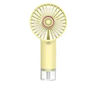 Ventilador nebulizador portátil de mano con carga USB y tanque de agua en color amarillo
