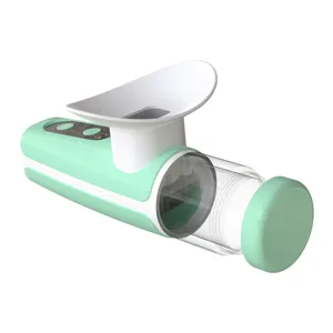 Portable eye nebulizer for moisturizing eyes, features a soft white mask and green body.
