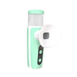 Side view of mint green eye steaming mist nebulizer for dry eye relief