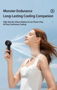 Detailed shot of a handheld mini fan providing a refreshing breeze to a woman outdoors