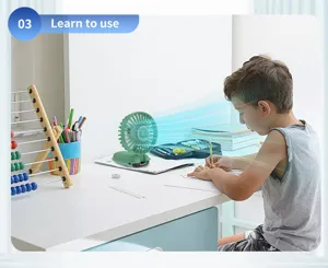 Detailed scene of a child using a green portable USB mini fan at a white study desk