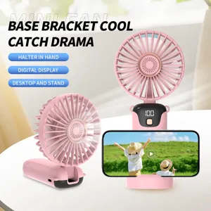 Portable pink handheld fan featuring a digital display and built-in base phone stand