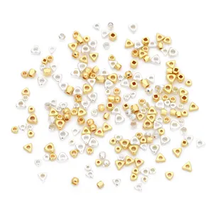 Assorted 14K gold and silver-plated geometric spacer beads for DIY jewelry projects