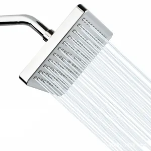 Detailed close-up of a 6-inch square rain shower head showing powerful water flow streams