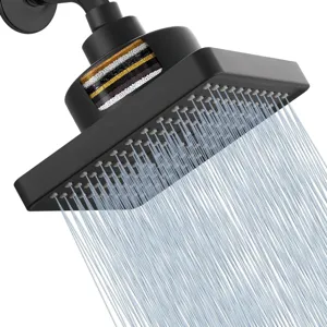 Close-up of black 6-inch rainfall shower head with visible multi-layer mineral filter beads