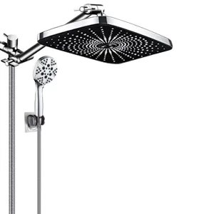 Close-up of square rain shower head and handheld spray in a modern chrome set