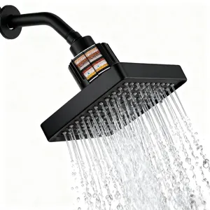 Detail of 6-inch matte black filtered rain shower head showing internal multi-stage media