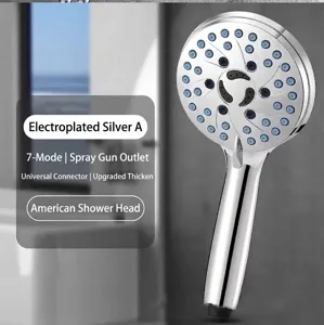 Detailed view of a multi-functional chrome shower head with blue high-pressure nozzles