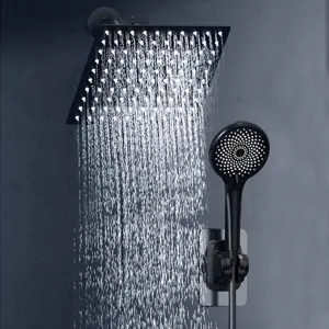 Detail view of modern matte black rainfall shower head with handheld spray wand