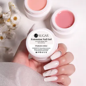 Detail of UR SUGAR 15ml extension nail gel jar and pinkish-white manicured nail effect