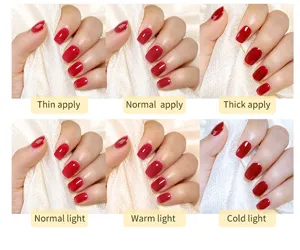 Detail view of red nail gel polish showing different application thickness and lighting.