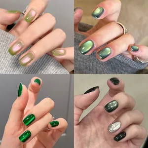 Detailed showcase of summer green cat eye magnetic gel nail polish with glass bead effects