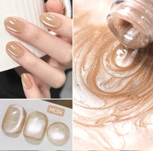 Close-up detail of champagne nude cat eye nail gel with fine shimmer and magnetic effect