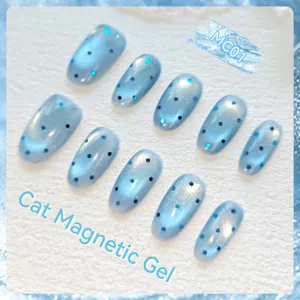 Light blue cat eye magnetic gel nails with fine shimmer and blue glitter accents MC01