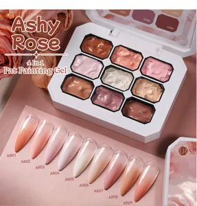 Close-up of 9-color solid nail painting gel palette with gradient blush effect nail tips