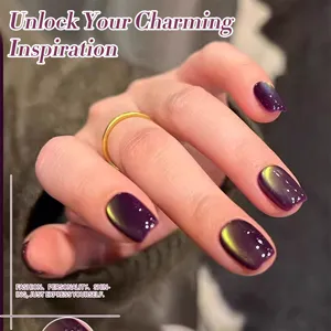 Close-up view of dark purple fruit cat eye nail polish with vibrant green glass bead shimmer