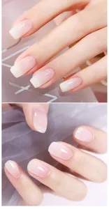 Detailed view of milky white jelly gel polish showing a soft gradient ombre effect
