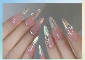 Close-up of sparkling emerald cat-eye nail gel effect with rhinestones on long nails