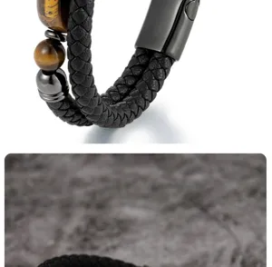 Close-up of men's double-row braided leather bracelet with tiger eye beads and magnetic clasp
