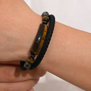 Vintage men's bracelet featuring natural tiger eye stone beads and black braided leather cord