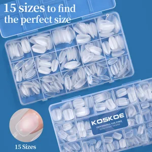 Macro detail showing the 15 available sizes of matte almond-shaped nail tips in a blue box.