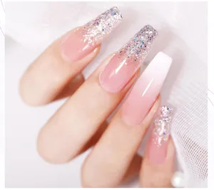 Detailed close-up view of long coffin nails with pink and silver glitter ombre design