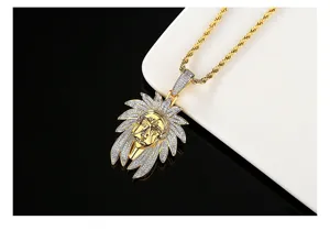 Macro view of a gold-plated hip hop pendant with an intricate Indian chief head design.