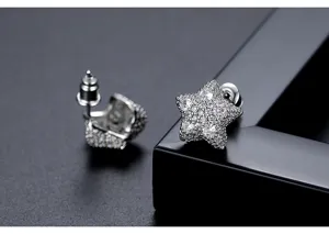 Detailed macro shot of star-shaped stud earrings featuring sparkling micro-pavé cubic zirconia