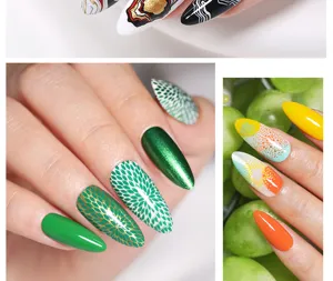 Primer plano de diseños de manicura con intrincados estampados en verde y naranja