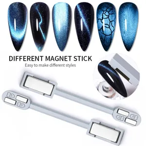 Detailed macro view of dual-head nail magnets creating various cat-eye blue patterns