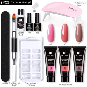 Kit completo de extensión de uñas con gel, lámpara UV y 100 tips para manicura profesional.