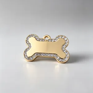 Gold stainless steel bone pet tag pendant with clear crystal rhinestones detail close up