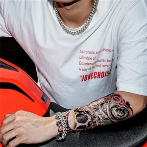 Close-up of 12mm iced out silver Cuban link chain and bracelet on hip-hop model