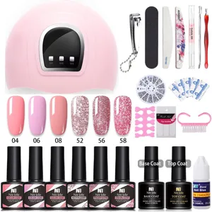 Kit professionale per unghie con lampada UV LED, vari colori e strumenti essenziali.