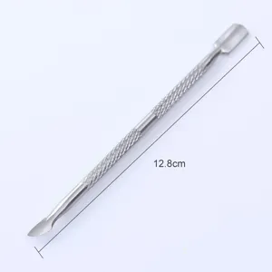 Macro detail of a 12.8cm stainless steel double-ended nail cuticle pusher tool