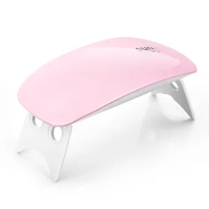 Lámpara de uñas LED UV mini rosa con forma de ratón para secar esmalte de gel mediante USB.
