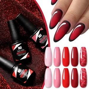 Set smalto gel UV Née Jolie con glitter e colori rossi pieni su sfondo glitterato
