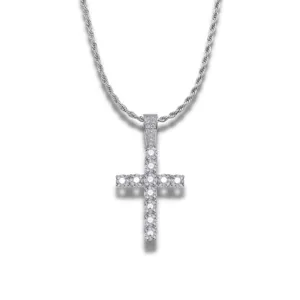 Close-up view of iced out crystal cross pendant necklace with silver rope chain