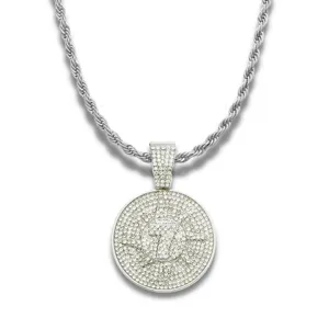 Detailed view of silver hip hop necklace with rhinestone encrusted circular number 7 pendant
