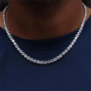 Close-up of a 14mm sparkling tennis necklace worn on a neck over a dark blue t-shirt