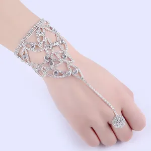 Elegant rhinestone hand back chain bracelet ring set for bridal or Latin dance performance.